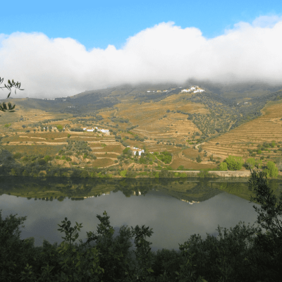 a body of water near a mountain