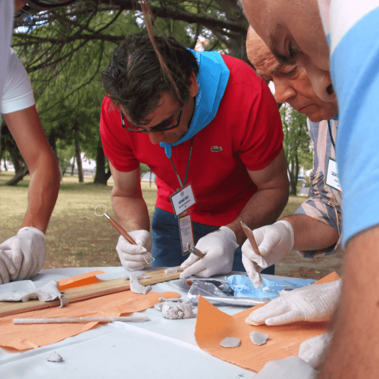 a group of people doing crafts