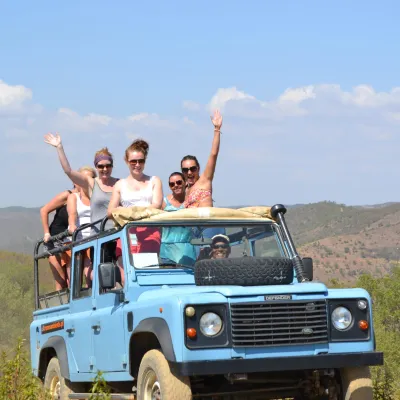 a group of people on a jeep