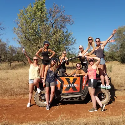 a group of people on a buggy