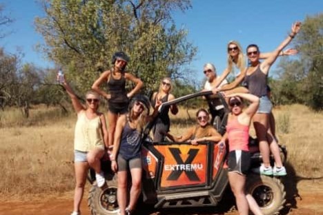 a group of people on a buggy