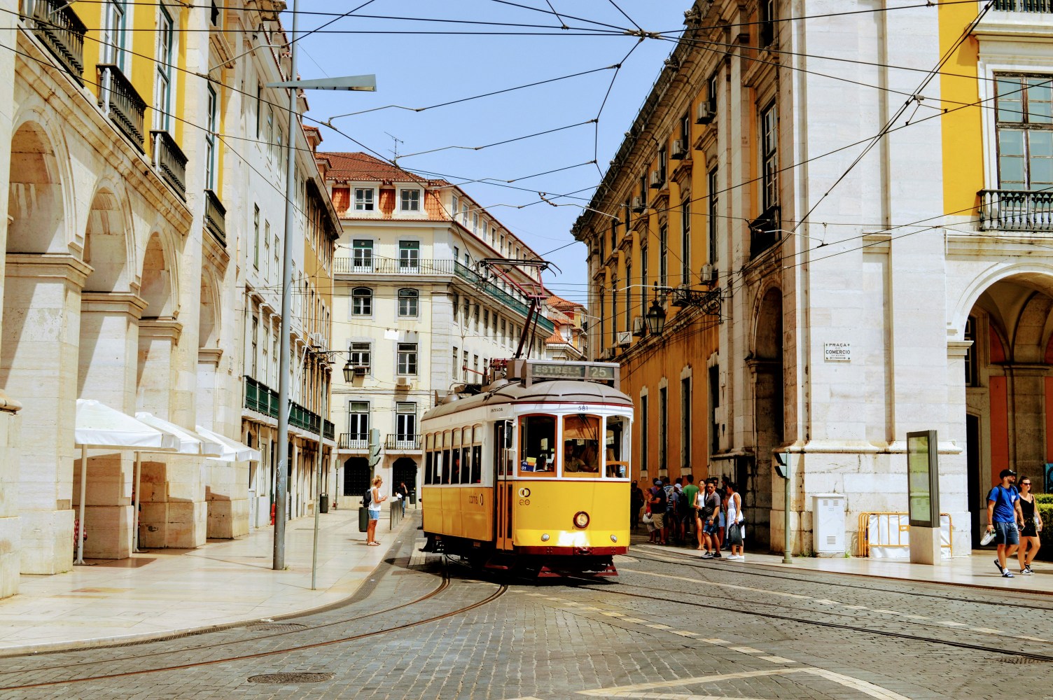 a train is parked on a city street
